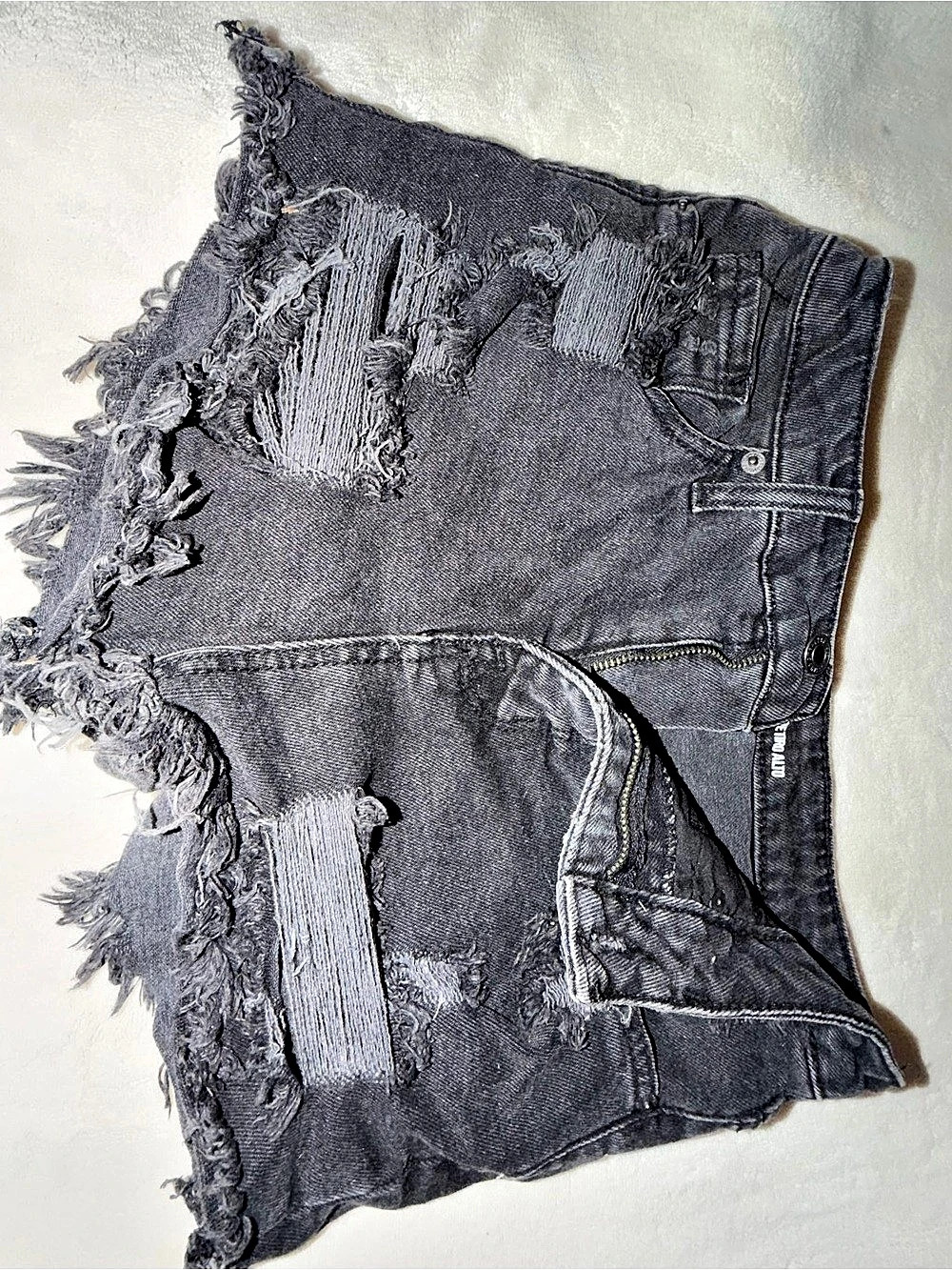 Distressed Frayed Jean Shorts in Black